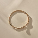 Serpent Snake Bangle in bronze from above, showing its full round shape.