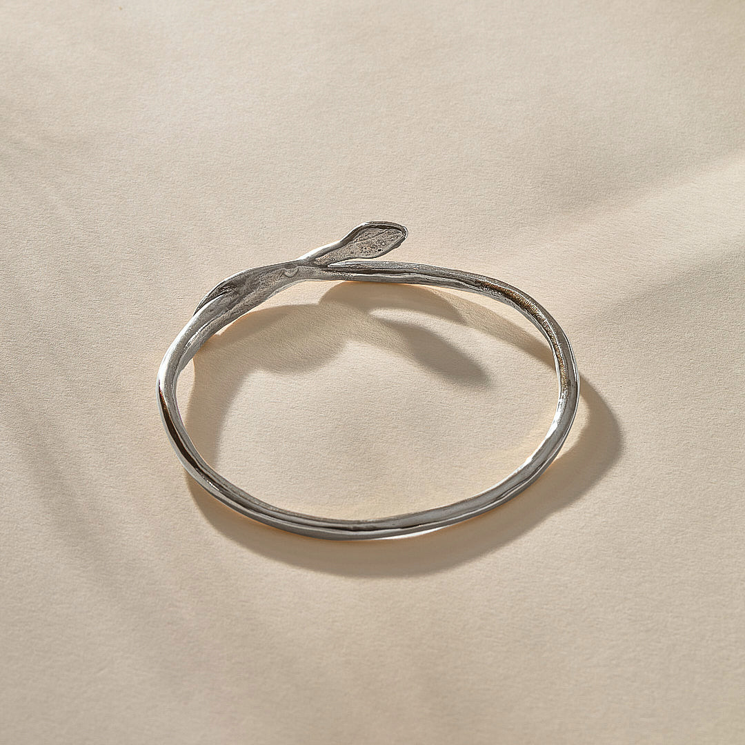 Serpent Snake Bangle in sterling silver with the snake head raised.