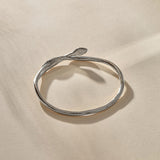 Serpent Snake Bangle in sterling silver with the snake head raised.