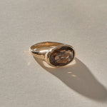 Smoky Quartz Signet Ring in recycled bronze, low angle view of the signet face