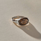 Smoky Quartz Signet Ring in recycled sterling silver, low angle view of the oval stone