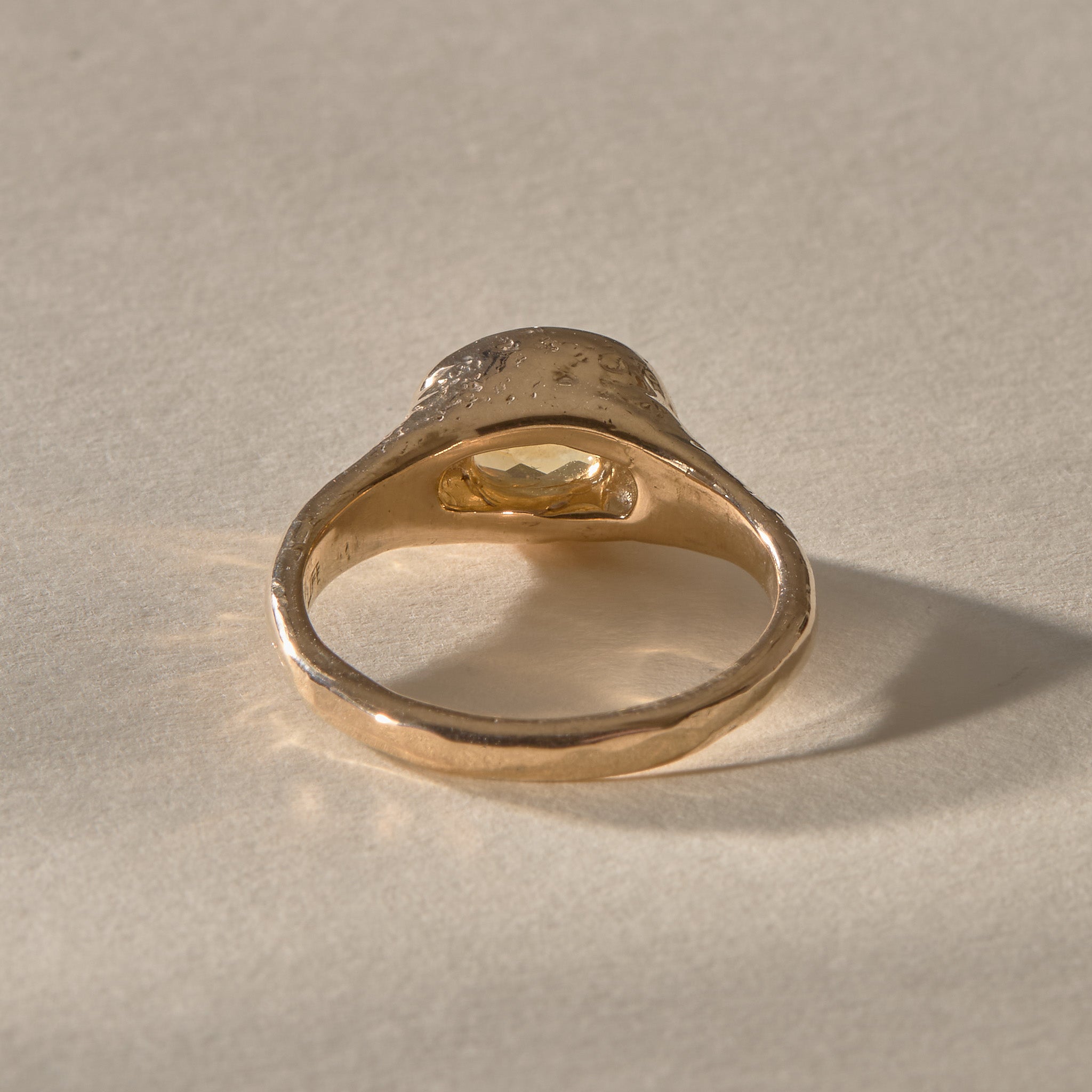 Back of the Solara Ring, showing the open back that lets the citrine touch the skin.