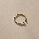 Solea Toe Ring in solid recycled gold, front view showing the adjustable opening