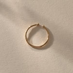 Solea Toe Ring in solid recycled gold, thin adjustable open band seen from above