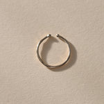 Solea Toe Ring in recycled sterling silver, angled view showing the adjustable opening