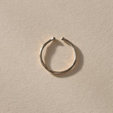 Solea Toe Ring in recycled sterling silver, angled view showing the adjustable opening