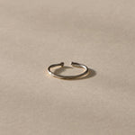 Solea Toe Ring in recycled sterling silver, side view of the delicate band