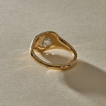 Back of the Vía Láctea I ring, showing the gold setting beneath the raw diamond and the polished band.