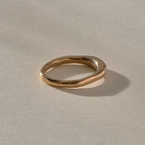 Wabi Ring in recycled bronze, side view of the band tapering from 4mm to 2mm