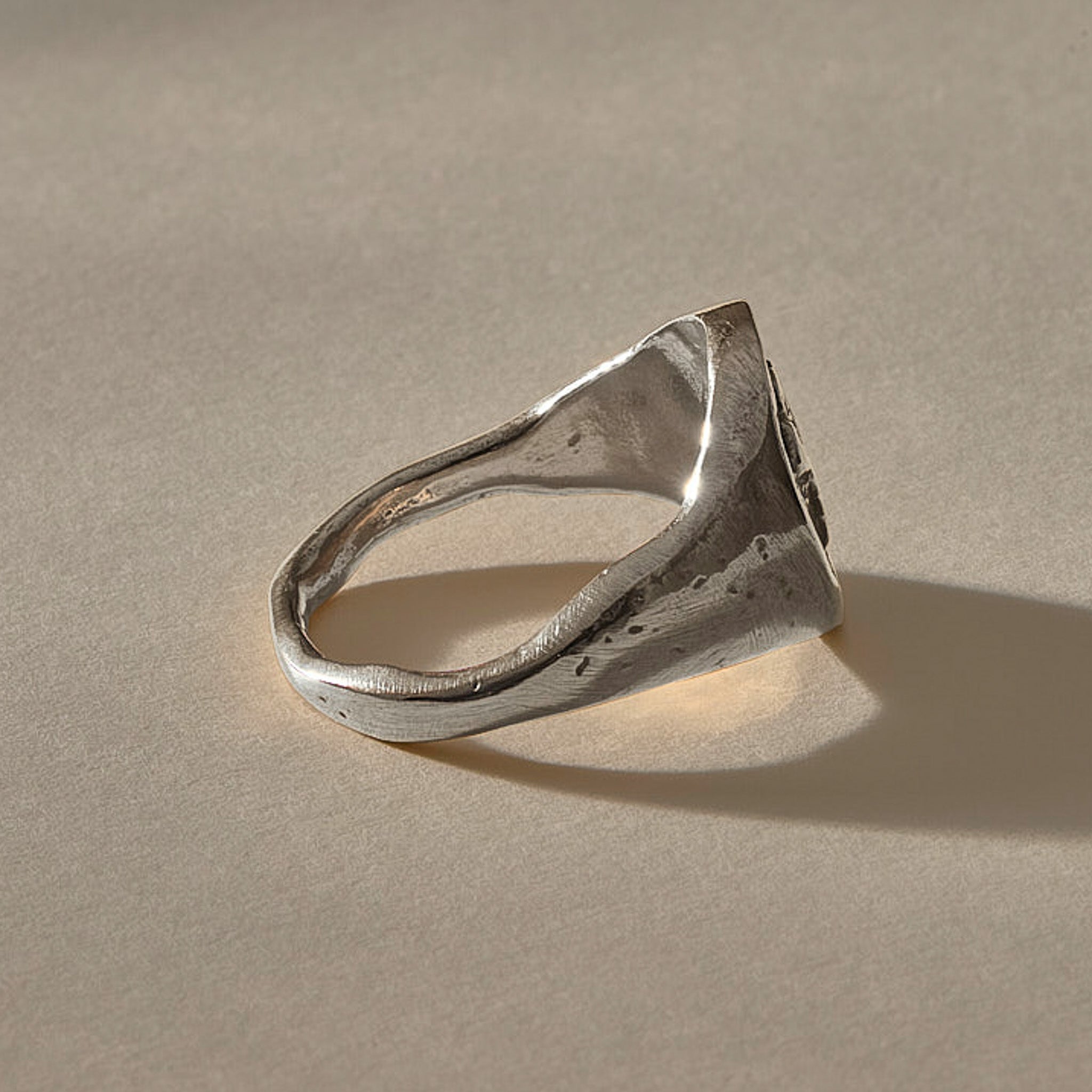 Wild Rose Ring in recycled sterling silver, side view of the band tapering to 2mm