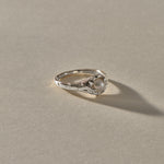 Yemayá Pearl Ring in silver from the other side, its pearl catching the light.