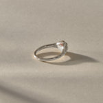 Yemayá Pearl Ring in sterling silver from the side, with the pearl rising from the textured setting.