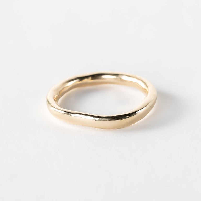 Mist Ring in solid recycled gold on a white background